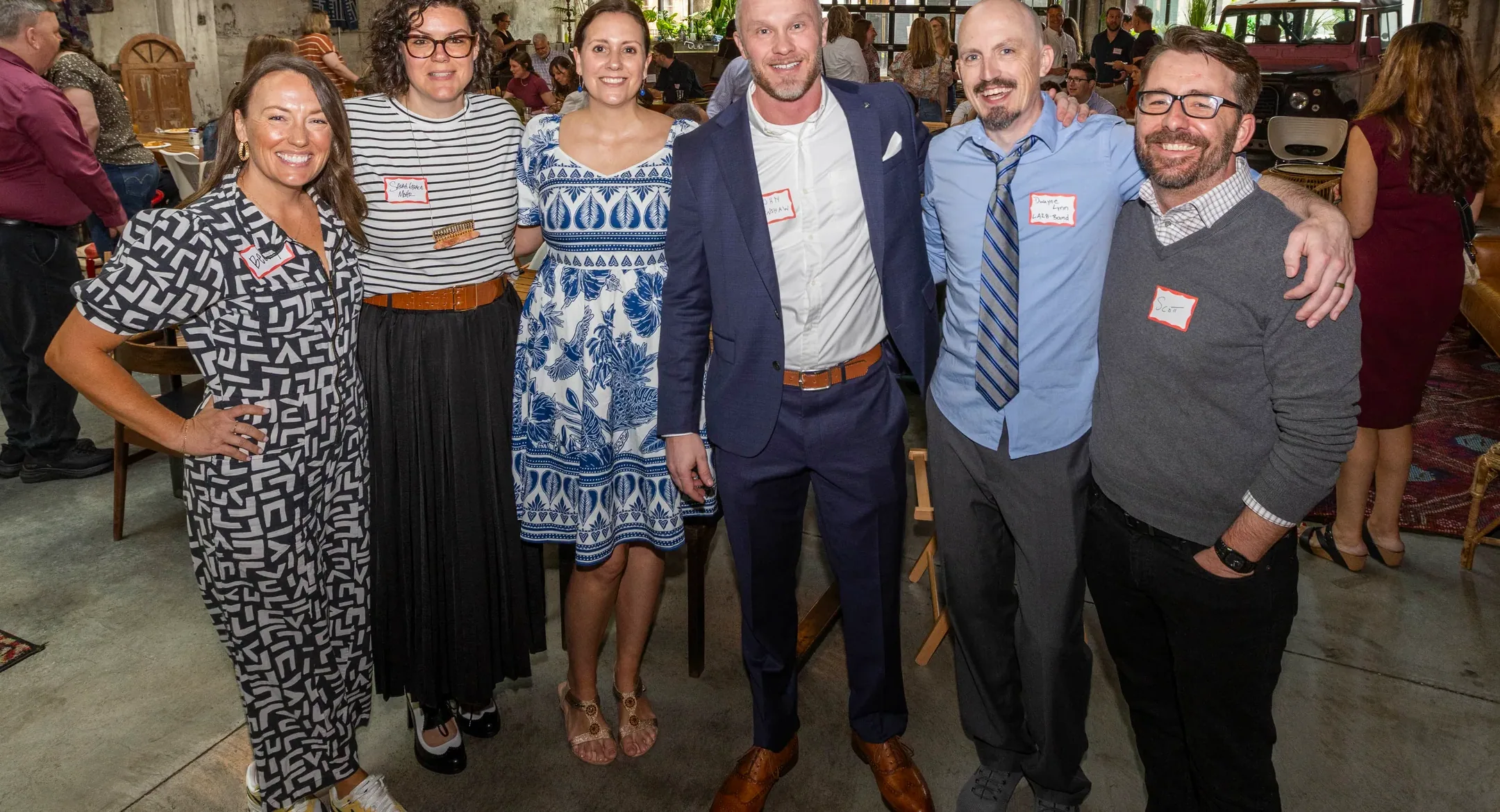 The Envision Promotions team together at a partner event