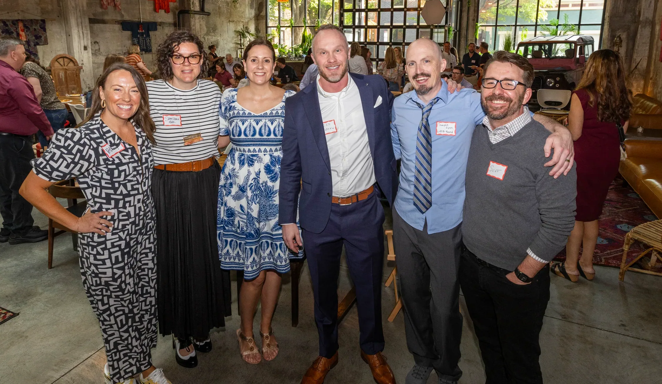 The Envision Promotions team together at a partner event